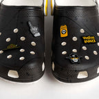 The five Voodoo Ranger jibbitz shown on two black Crocs